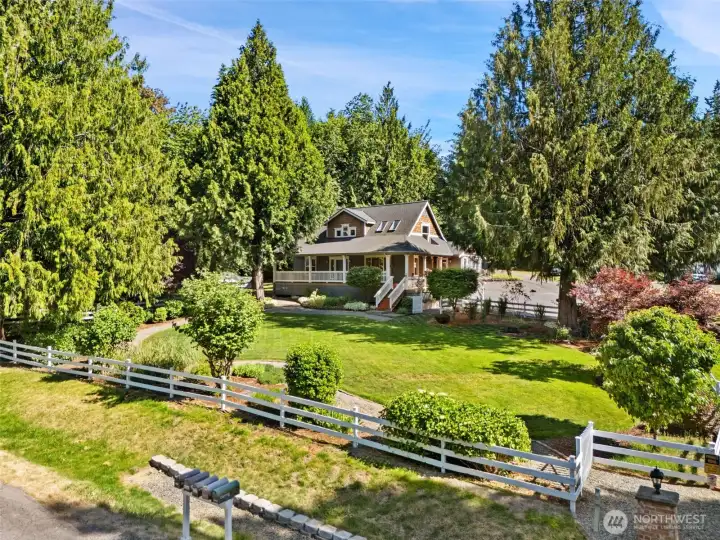 An elevated view from the edge of the property highlights the generous scale and privacy of the estate.