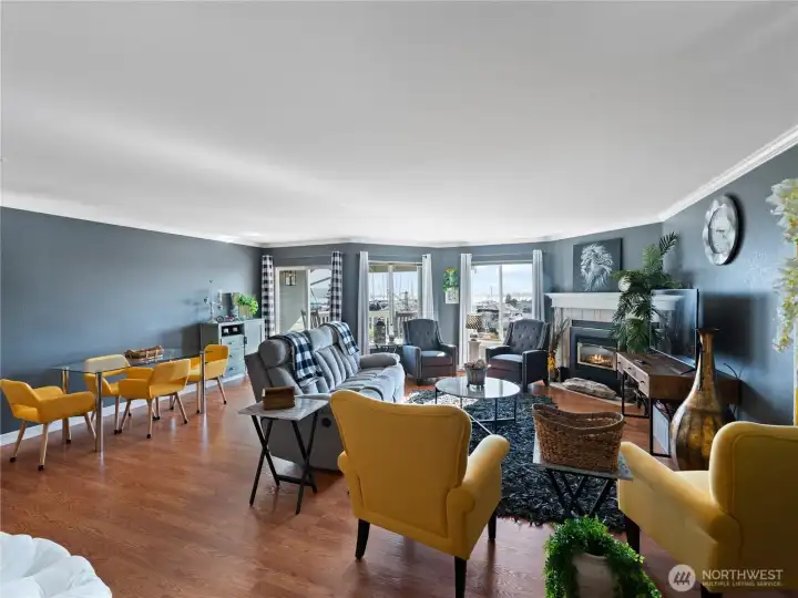 Open living and dining rooms are fully furnished with ample conversational seating and ready for you to enjoy. Gas fireplace, fresh paint and newer LVP flooring.