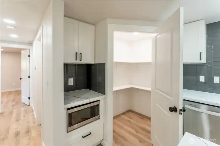 Coffee nook with built in microwave and walk in pantry