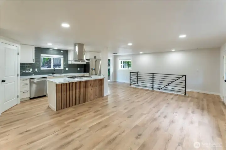 Spacious kitchen and dining area with beautifully updated finishes and stainless steel appliances