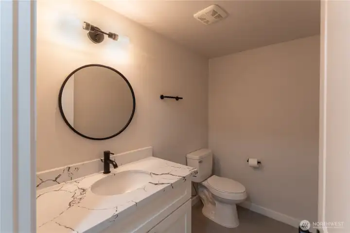 Half bath located upstairs