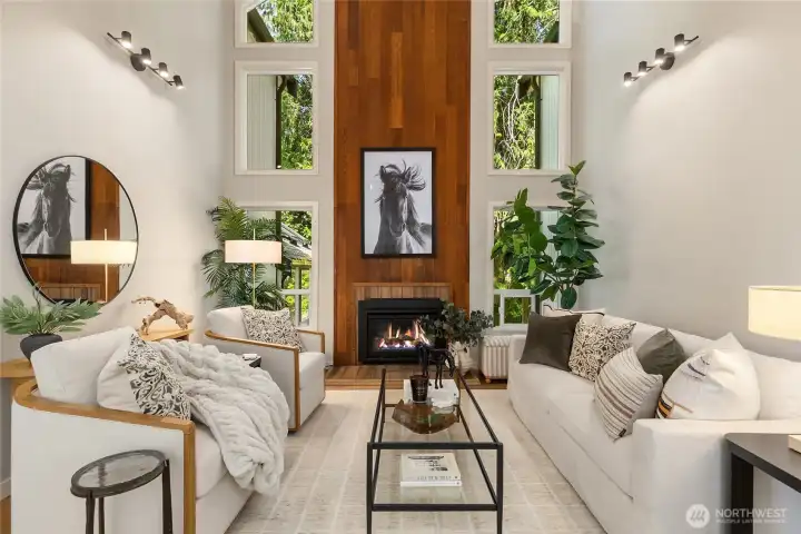 Designed to bring the outdoors in, the Great Room is a peaceful retreat featuring dramatic vaulted ceilings and expansive windows that showcase the surrounding evergreens. Designed to bring the outdoors in, the Great Room is a peaceful retreat featuring dramatic vaulted ceilings and expansive windows that showcase the surrounding evergreens.