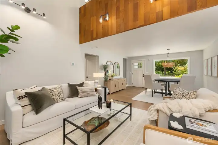 The home's architecture is on full display as the open loft, beautifully wrapped in rich wood detailing, overlooks the dining area and Great Room below. The home's architecture is on full display as the open loft, beautifully wrapped in rich wood detailing, overlooks the dining area and Great Room below.