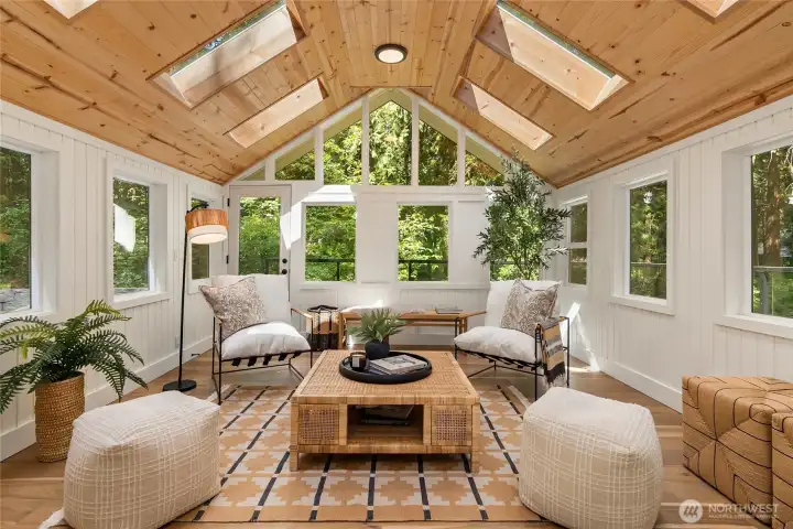 Perhaps the home's most captivating space, the sunroom is a private retreat where architecture and nature come together beautifully. Perhaps the home's most captivating space, the sunroom is a private retreat where architecture and nature come together beautifully.