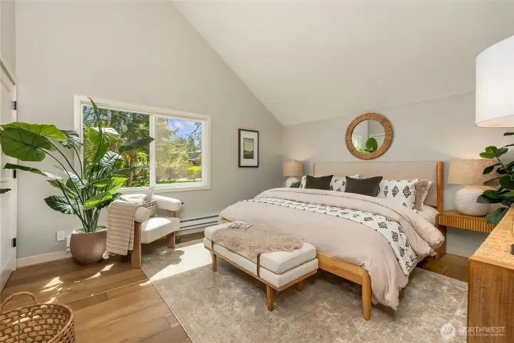 Your private sanctuary awaits upstairs. Vaulted ceilings, oversized windows framing mature evergreens, and warm natural finishes create a serene space designed for rest and relaxation. Your private sanctuary awaits upstairs. Vaulted ceilings, oversized windows framing mature evergreens, and warm natural finishes create a serene space designed for rest and relaxation.
