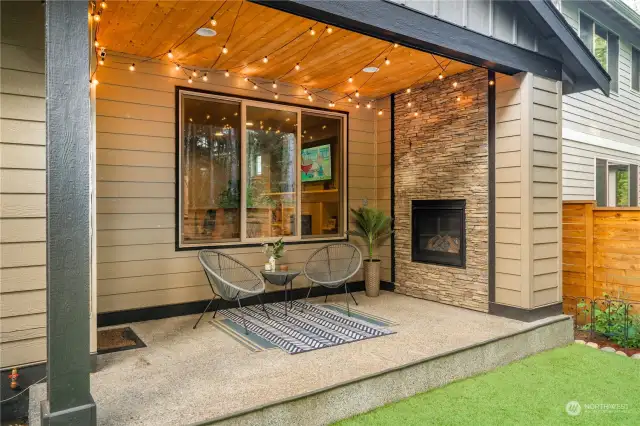 Indoor-outdoor living with cozy patio & fireplace