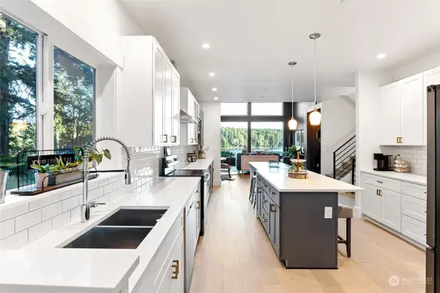 Such an amazing kitchen. An oversized sink tops off the abundant counter space and the large window will let plenty of light flow in. There is another large counter with tons of storage on the opposite side of the kitchen. No lack of places for your kitchen items here.