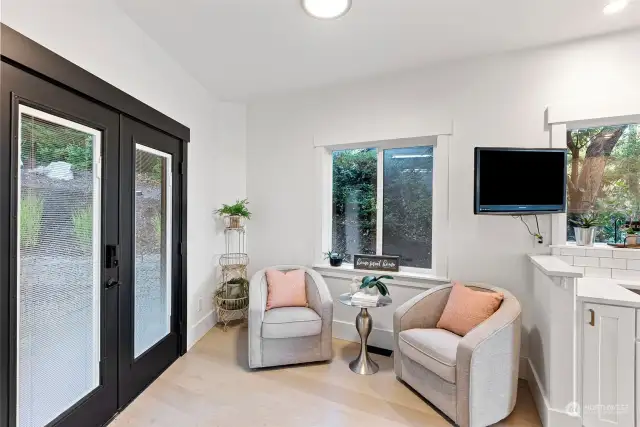 This space is perfect for enjoying your coffee in the morning or sharing a glass of vino in the evening with your partner. Don't want the extra seating space? How about using this for a breakfast nook or additional home office space? The double doors lead to the enclosed yard space.