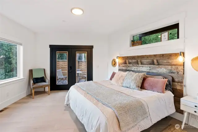 The design of this home is brilliant. The transom windows let in natural light but don't take away the wall space for your furniture. The beautiful floors are carried through as well.