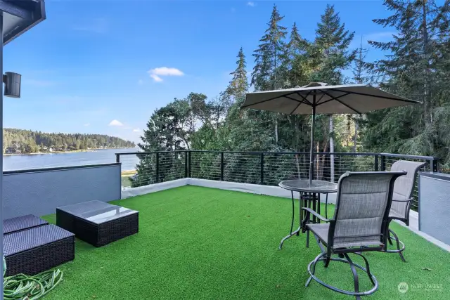 Sit out and enjoy the expansive views from this amazing space. Add some additional deck furniture, a propane fire table and let the party begin.