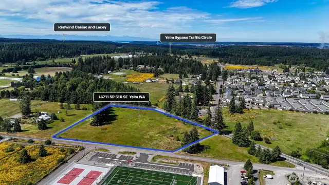 Property has road frontage on both Yelm Ave and 93rd. Blue boundary lines are approximate. Buyer to verify to their own satisfaction.