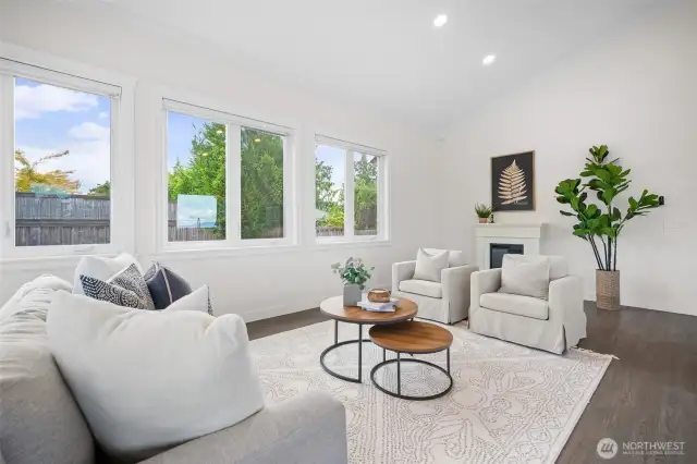 The open concept living, tall ceilings, and window package bring in plenty of light and keep the home bright & cheerful!
