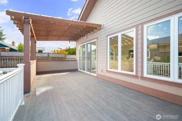 Partially covered deck, perfect for year round BBQ's & entertaining.