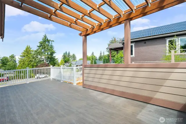 Sunny deck with partial bay view