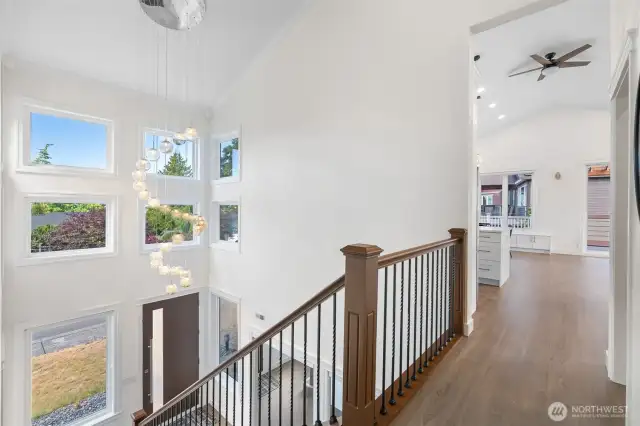 Windows bring light into a spacious entry way.