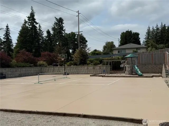 HOA's Private Recreation Court.  Shared between only 19 homes and their guests, this recreation area includes pickleball, basketball, swings, big toy, bocce ball, and open area.