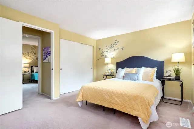 Primary bedroom with a closet