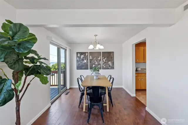 Formal dining room with slider onto new deck!
