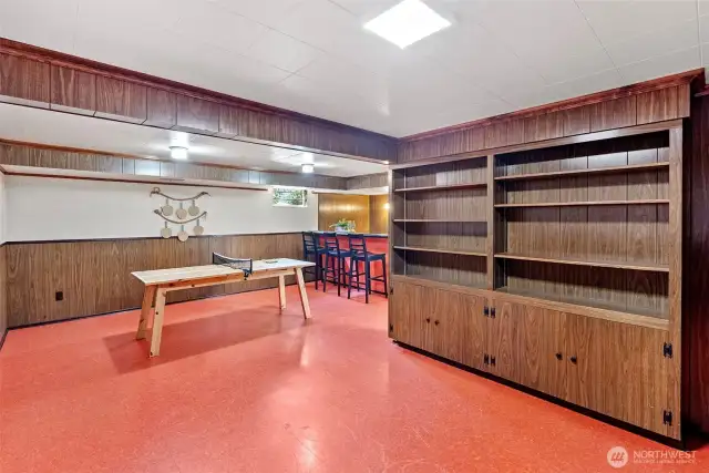 Lots of bookshelves and storage downstairs