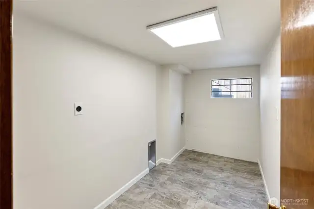 Recently completed finished space for laundry room
