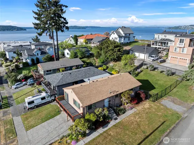 Plenty of street parking on this large corner lot!