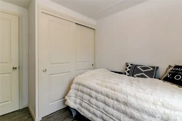 Bedroom/office space with large closet.