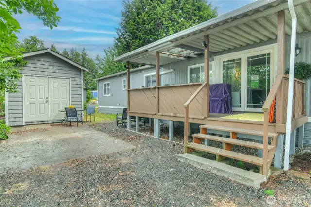 Additional parking off covered porch.