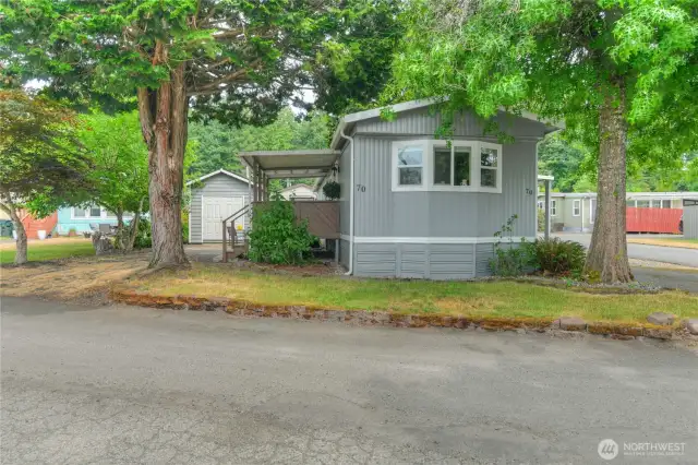 Front street view.  Over-sized corner lot.