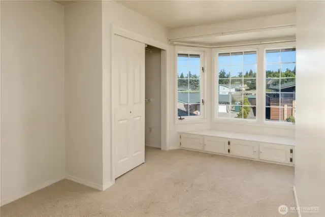 Bedroom with built-in sitting area