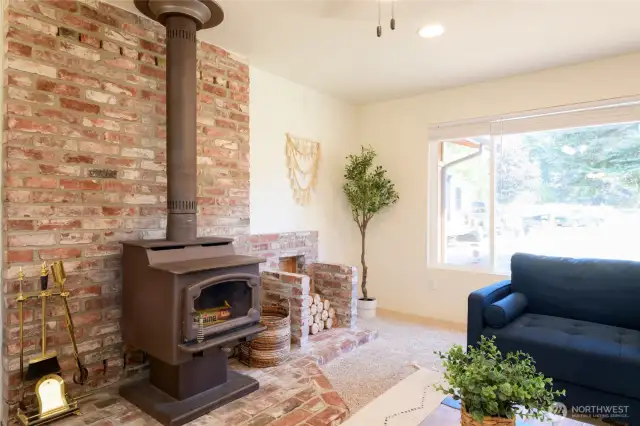 Recently serviced and cleaned the free-standing wood stove will provide comfortable heat all Winter long and keep your power bills low.