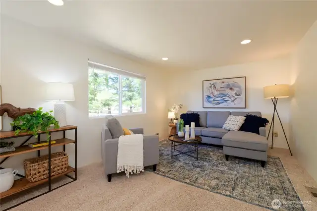 A spacious bonus room offers endless possibilities—perfect for a home office, media room, hobby space, or play area.