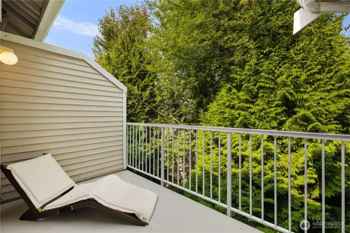 Private Deck: Serene deck retreat with full greenbelt views, offering unmatched privacy and space for outdoor relaxation.