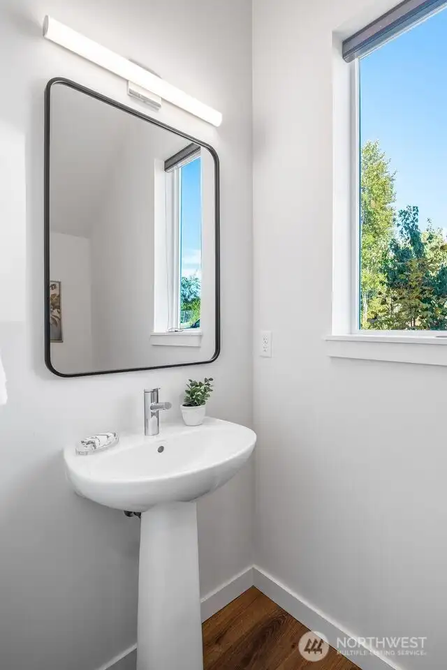 Half bath off entrance from garage.