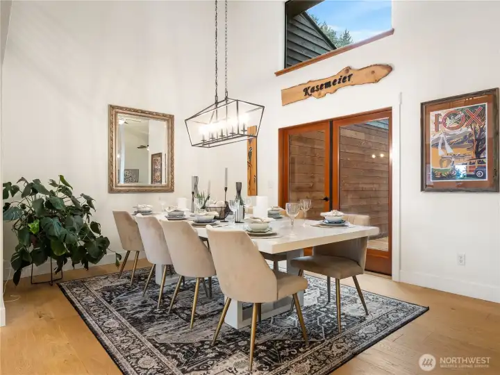 The large dining room lacks for nothing. Host large parties or intimate dinners; it accommodates it all.