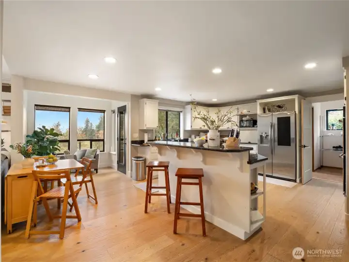 The large kitchen can handle more than one person working while others can watch or entertain.