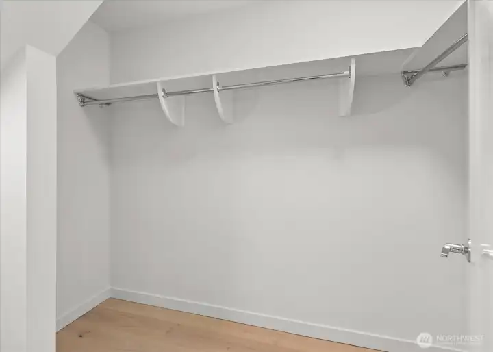 Second bedroom’s large walk-in closet with built ins.