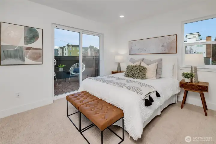Primary bedroom with its own private deck.