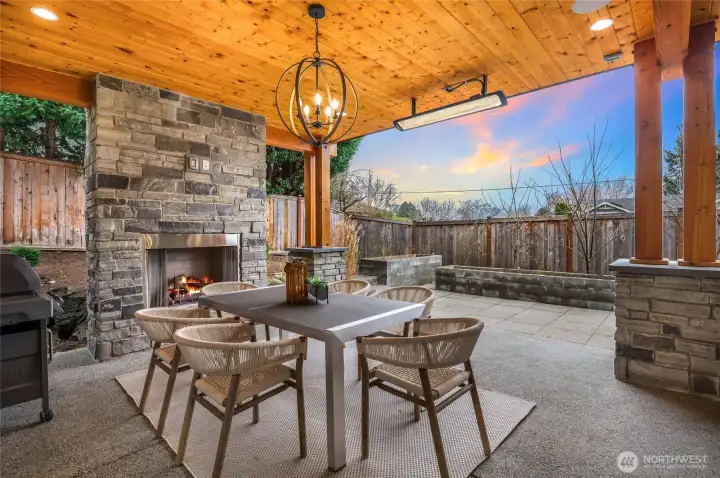Imagine dining alfresco in any weather with the overhead heaters in front of cozy fireplace!