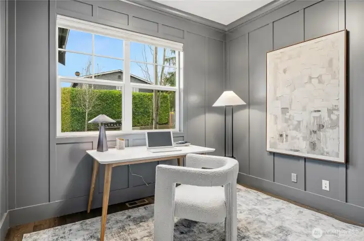 You'll be productive in this handsome wainscoted home office.