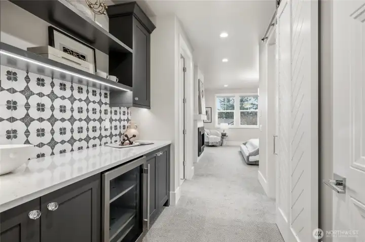 Coffee bar at the entrance to the primary suite makes the mornings run smoothly!