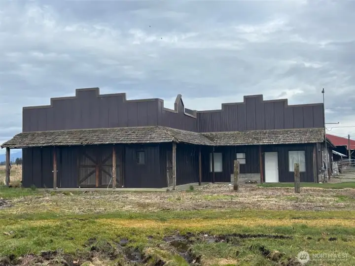 In this building there are a number of box stall and the potential for additional living space.