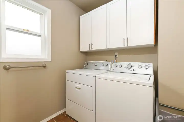 Lower level laundry room with 3/4 bath.