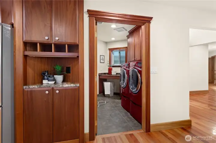Kitchen to spacious laundry room and 2 car attached garage.