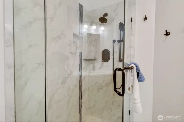Main level tile shower.