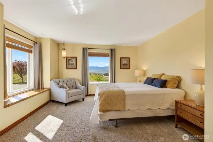 Main level bedroom with views of the hills.