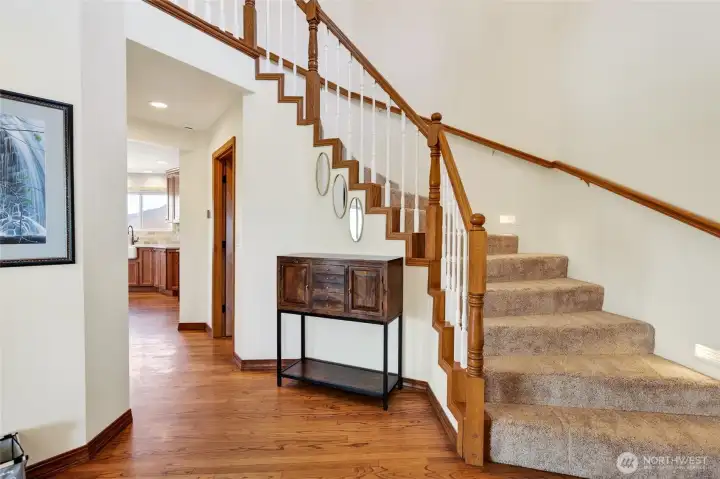 Grand entry with stairs to the upper level primary suite.