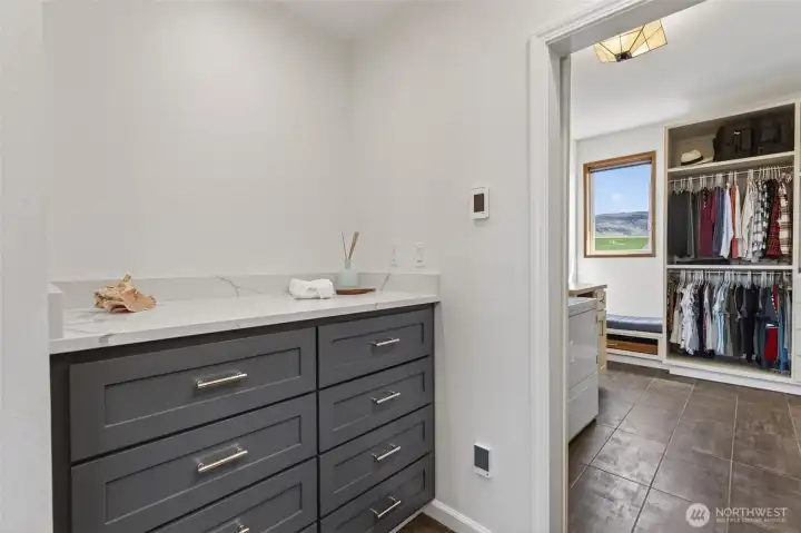 Primary built in dresser storage.