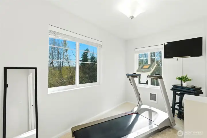 Flex room is perfect for a home office or gym.