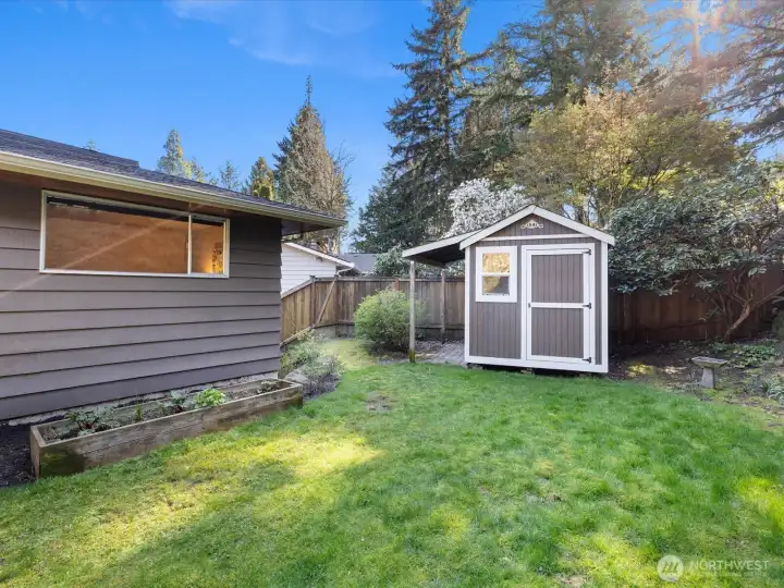 A convenient gardening shed and cover for your tools and toys.