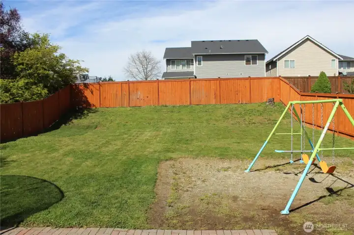 Level pad for a pool, hot tub or swing set area